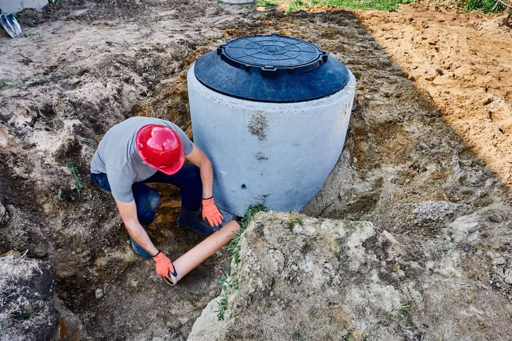 Connecting,Septic,Tank,To,External,Disposal,System,,Installing,Out-flowing,Pipe