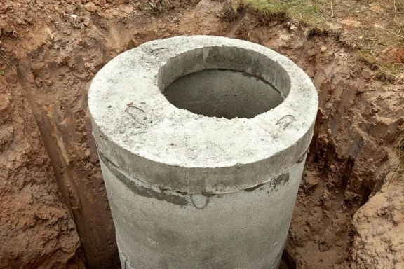 Precast concrete cesspool ring set for a new septic tank installation on Long Island